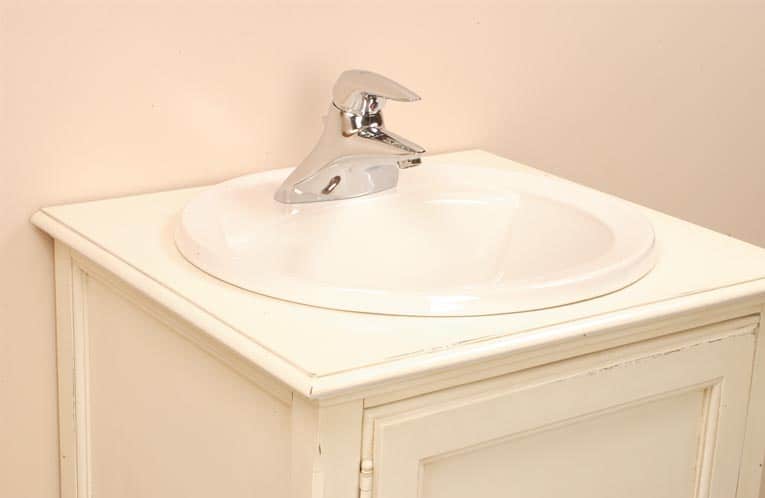 attaching bathroom sink to countertop