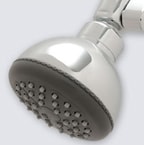 Low-flow showerhead over a white background.