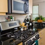 kitchen gas range and microwave