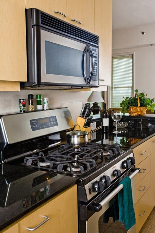 kitchen gas range and microwave