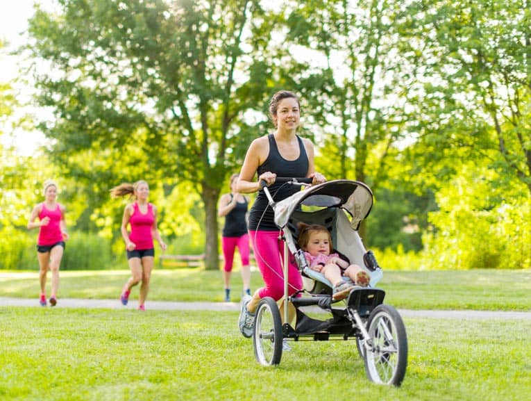 Tricycle-style strollers with large wheels make jogging fun for baby and mom (or dad) alike.