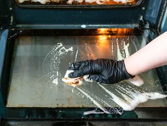 Steps to clean oven using a commercial cleaner