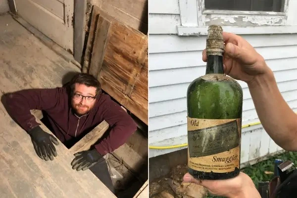 Nick Drummond and one of the many old liquor bottles found in his home