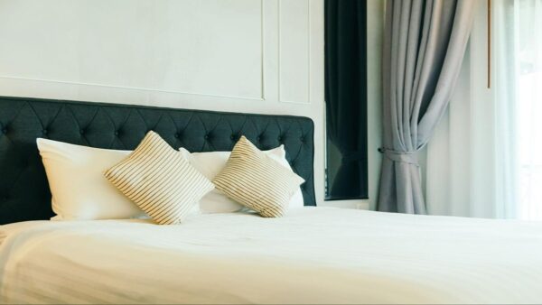 Bed with tufted headboard