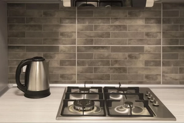 This kitchen backsplash features subway tiles with a matte finish.