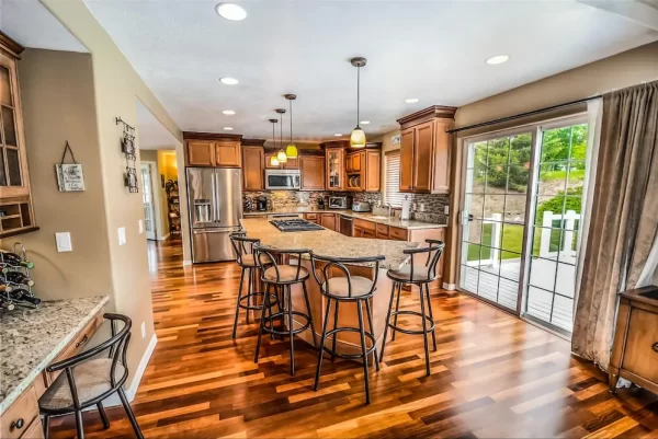 Generous breakfast bar is an extension off this large kitchen’s island.