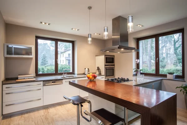 The sleek and plain cabinets perfectly complement this modern kitchen.