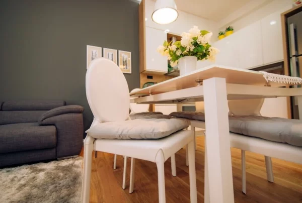 Not a Bobby Berk design, but the furniture resembles his ideology where the chair and bench can slide underneath the table