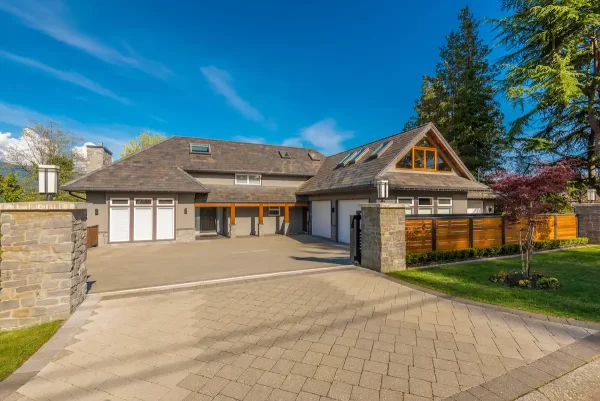 A concrete driveway that complements the color of home exterior. 