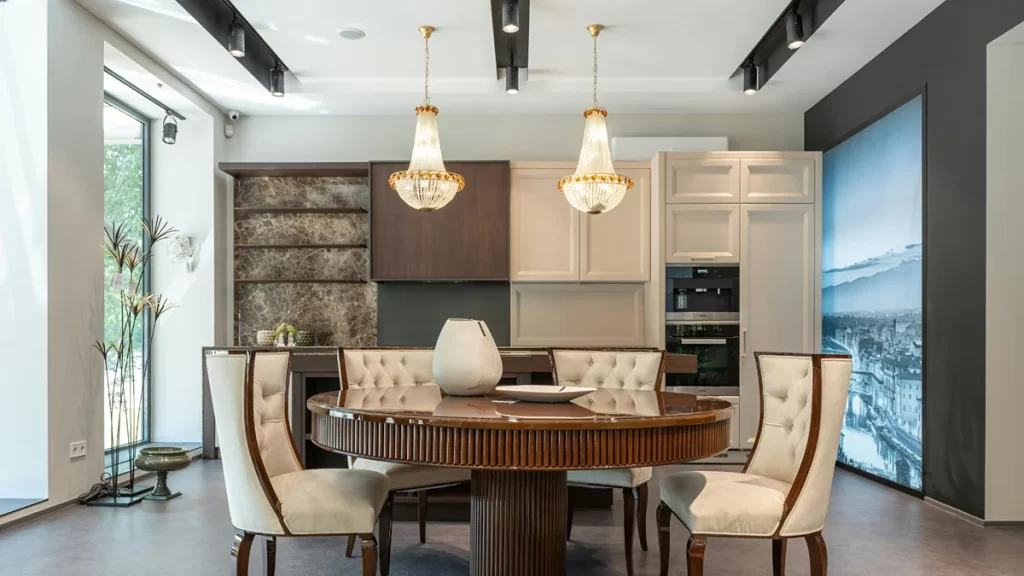 Two glorious glass pendant lights illuminating the dining room.