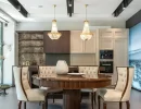 Two glorious glass pendant lights illuminating the dining room.