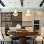 Two glorious glass pendant lights illuminating the dining room.