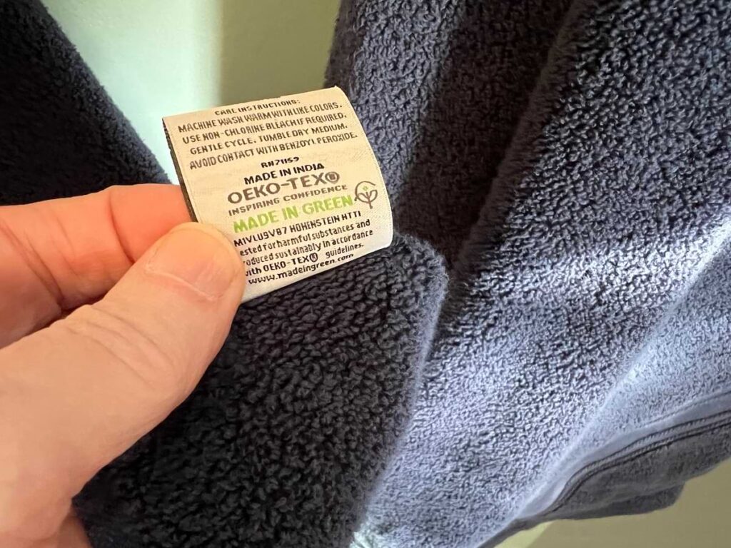 checking care label on towel